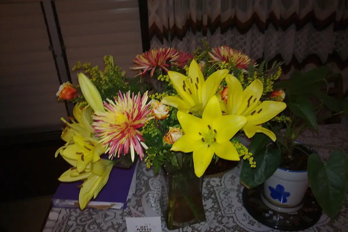 How to Arrange a Bouquet for a Small Vase shown in a clean flower-care setup