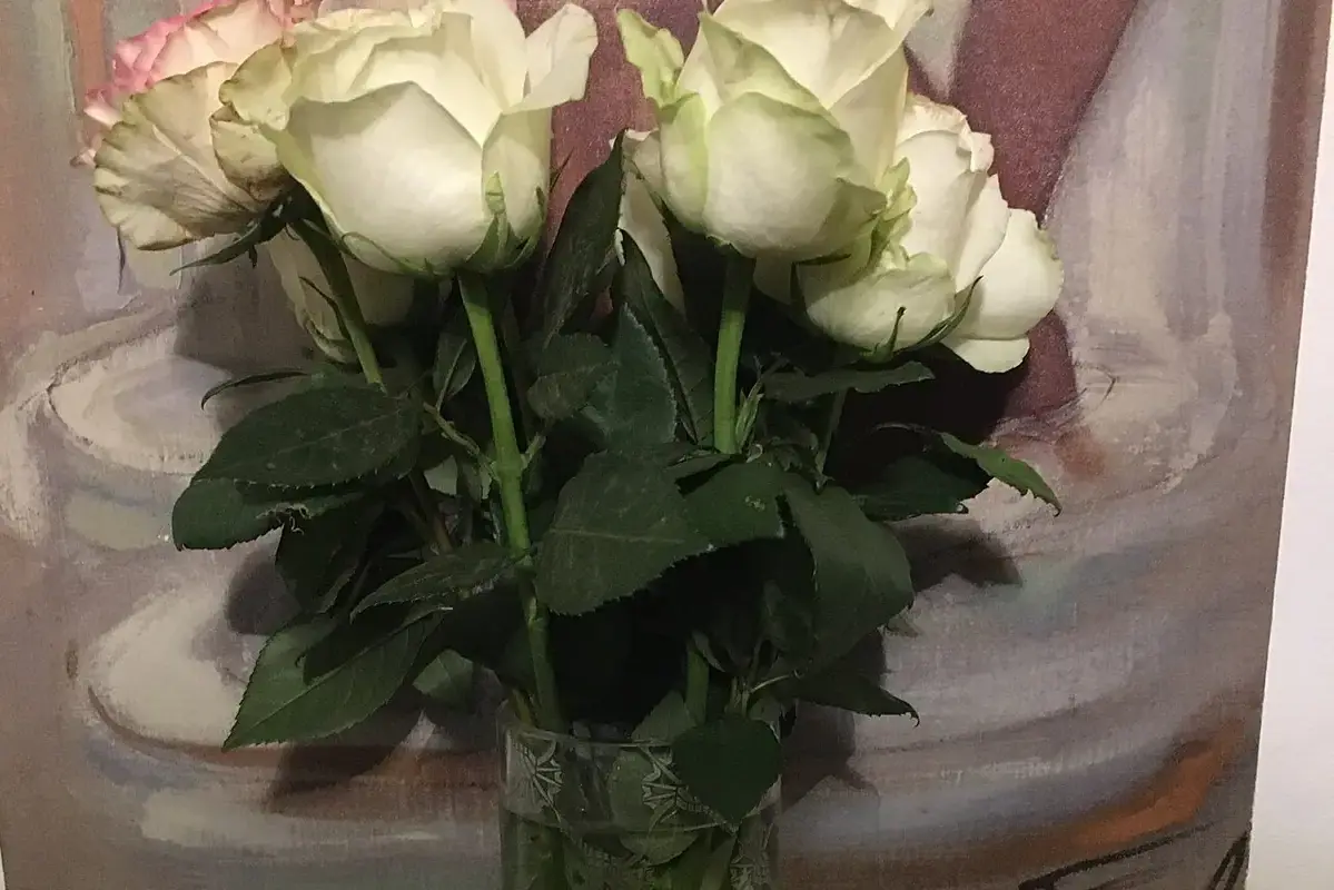 How to Arrange Flowers in a Mason Jar shown in a clean flower-care setup